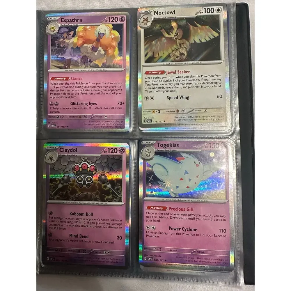 Lot of 80 holographic rare Pokemon cards.